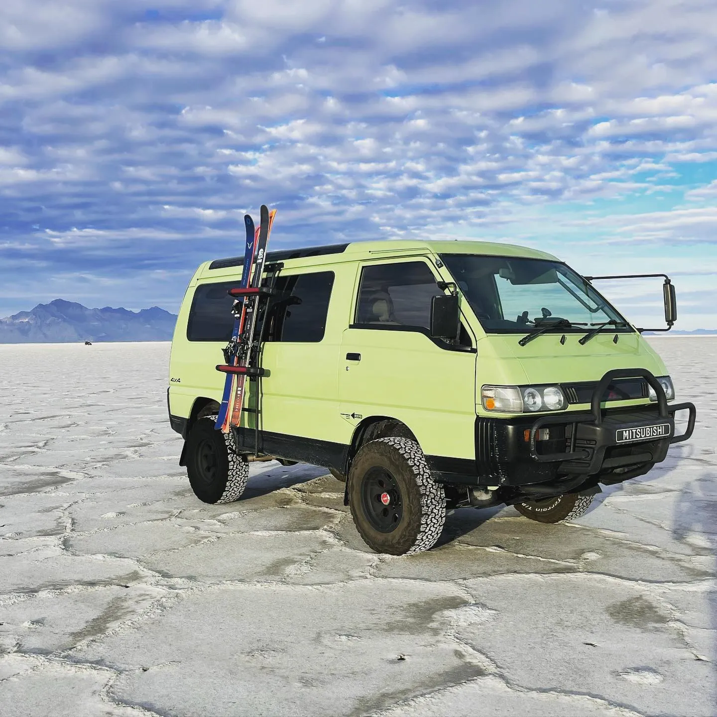 Restored Mitsubishi Delica L300 on the salt flats.